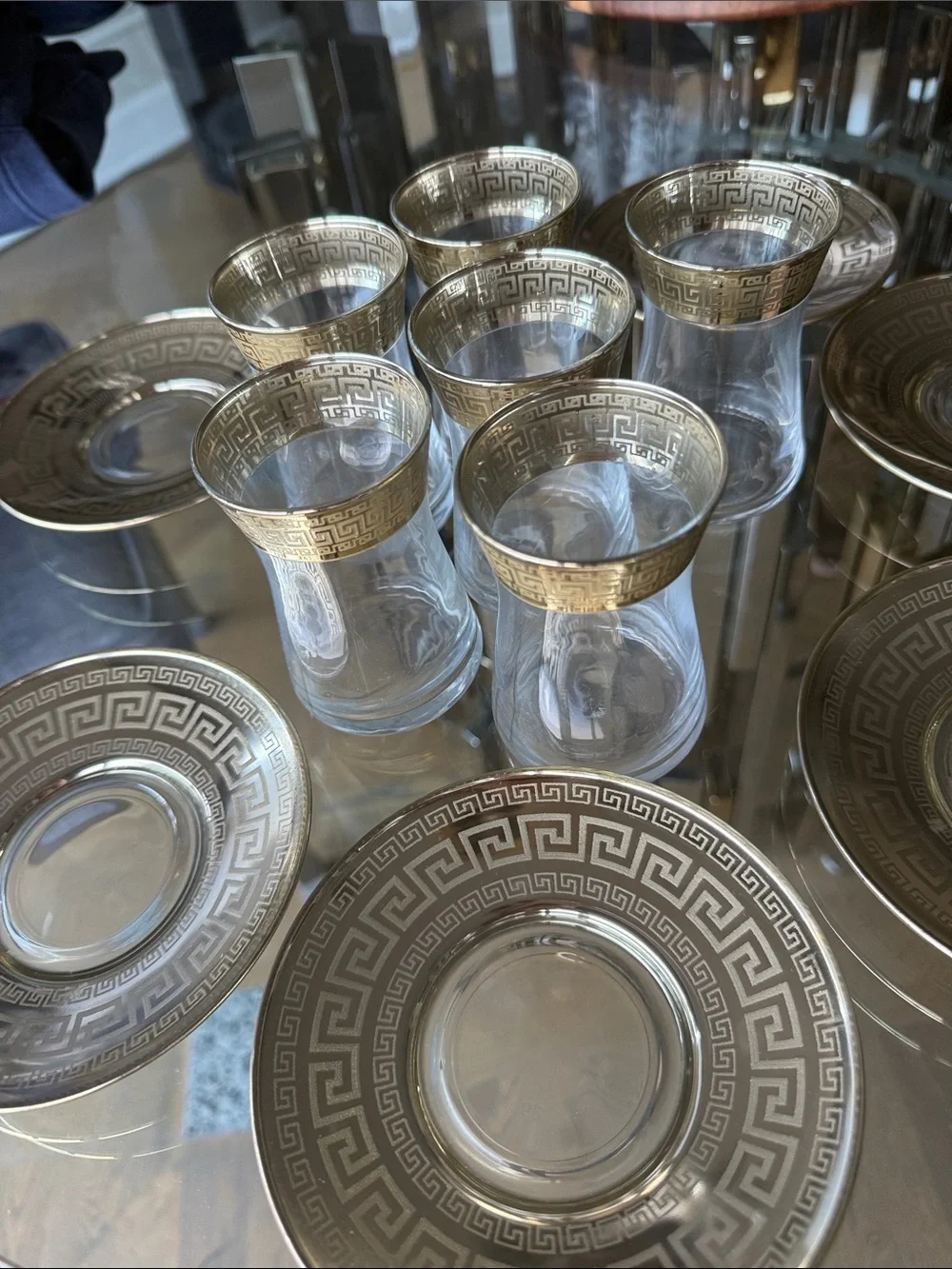 Clear Glass Tea Cup and Saucer Set with Gold Greek Key Accent
